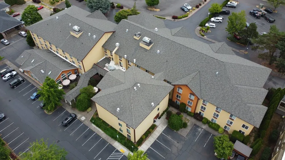 Slide of West Coast Roofing