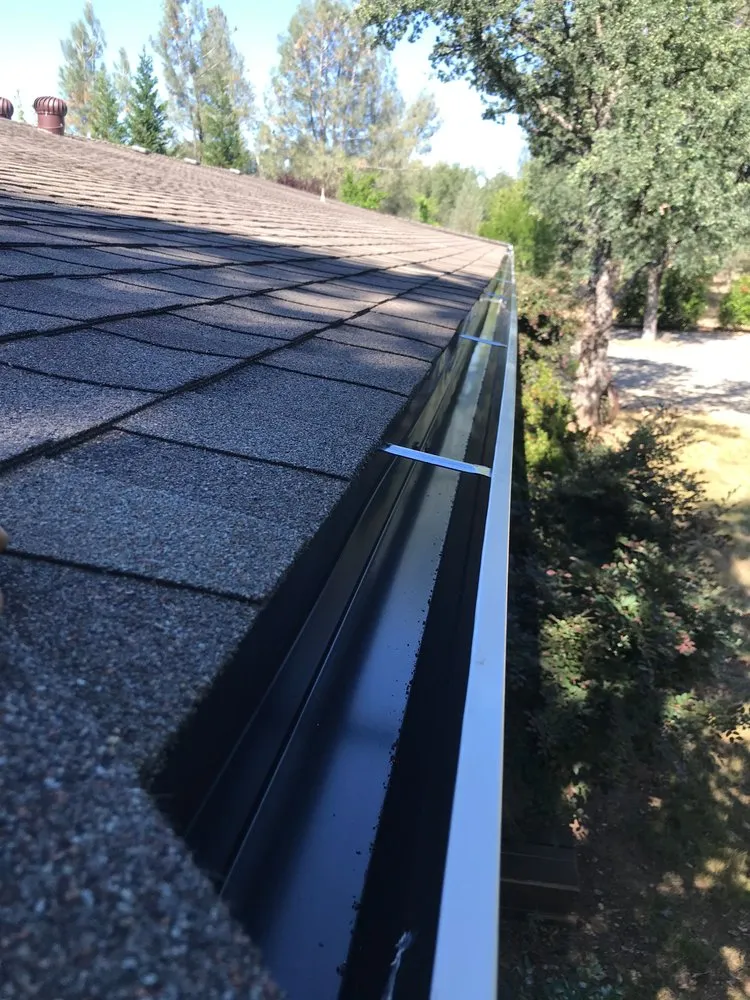 Slide of West Coast Seamless Gutters