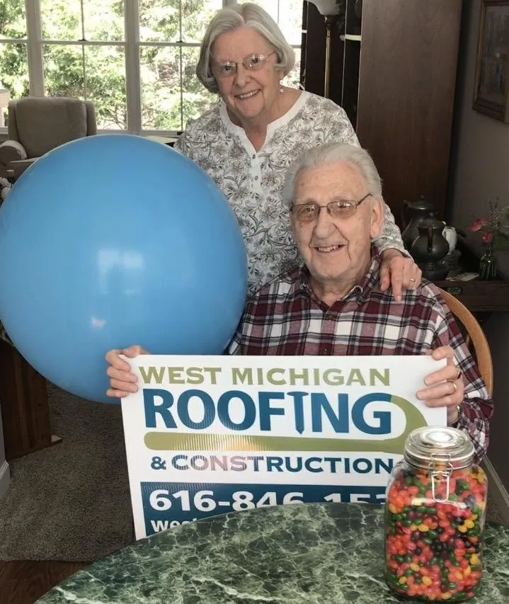 Slide of West Michigan Roofing & Construction