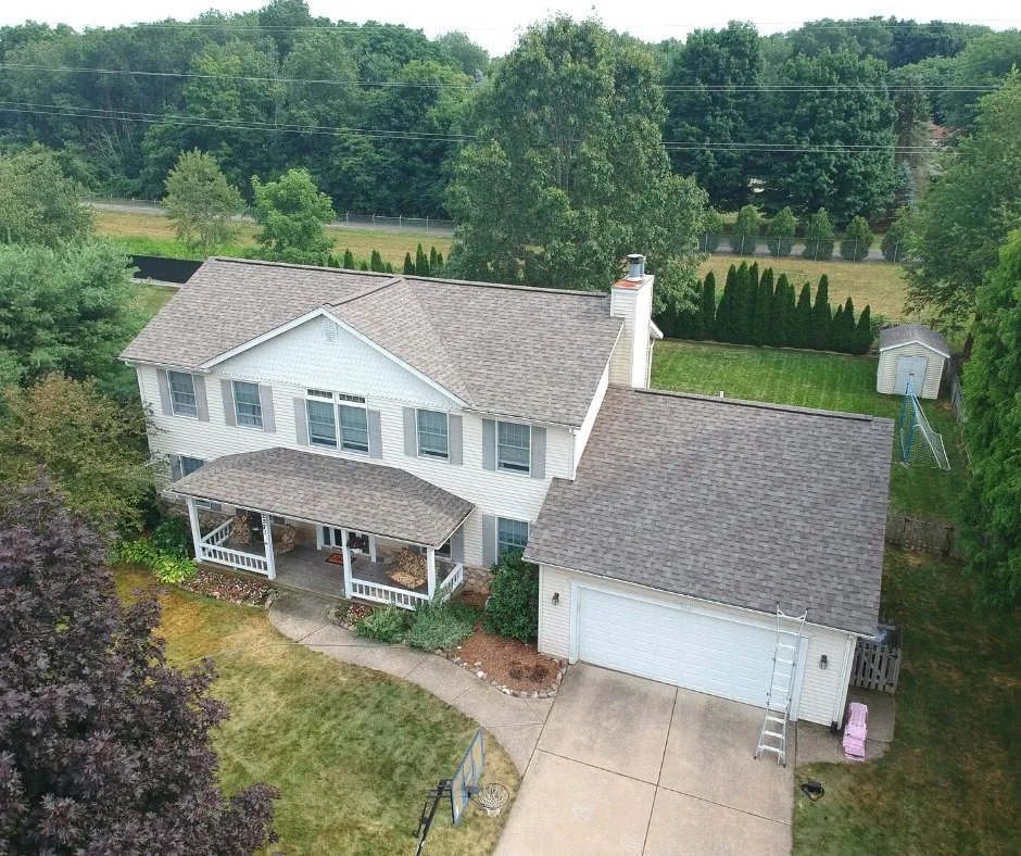 Slide of West Michigan Roofing & Construction