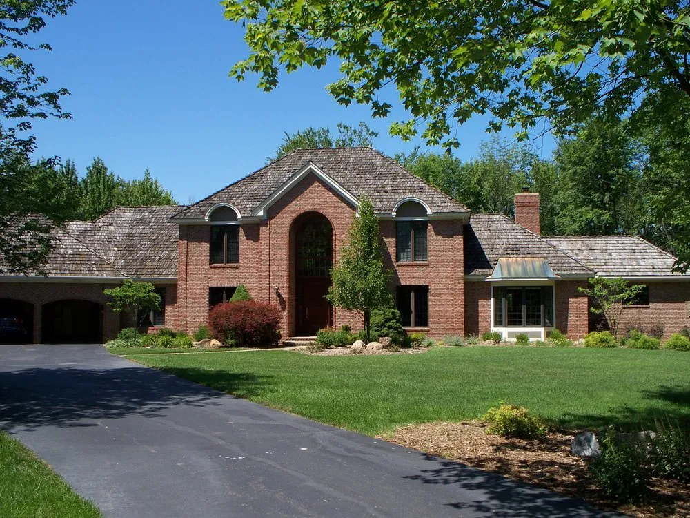 Slide of West Michigan Roofing & Construction