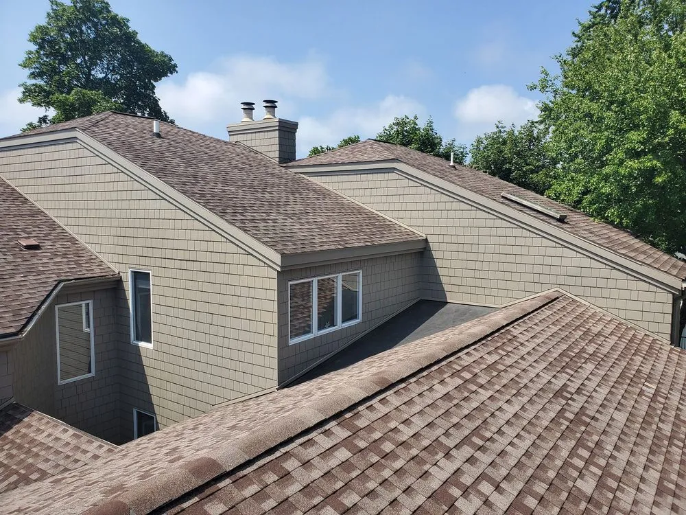 Slide of West Michigan Roofing & Construction