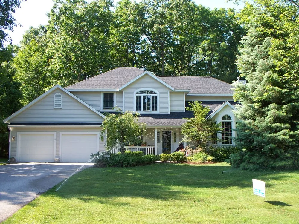 Slide of West Michigan Roofing & Construction