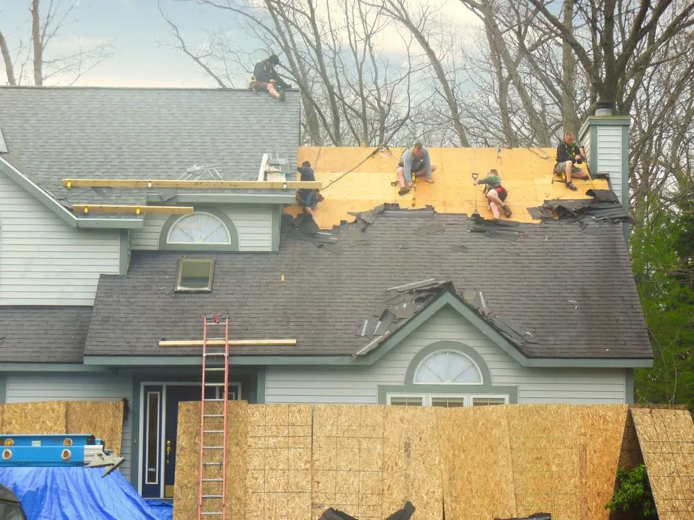 Slide of West Michigan Roofing & Construction
