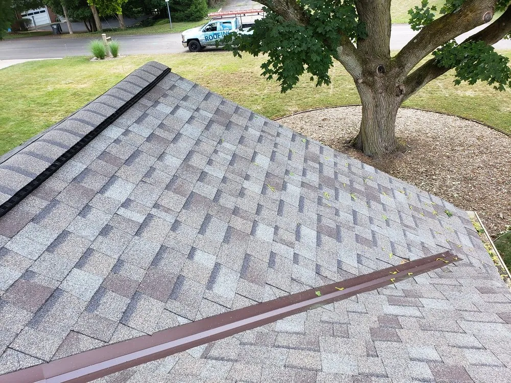 Slide of West Michigan Roofing & Construction