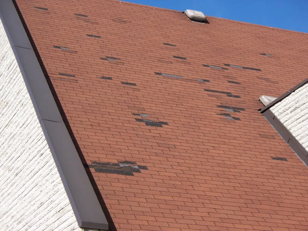 Slide of West Michigan Roofing & Construction