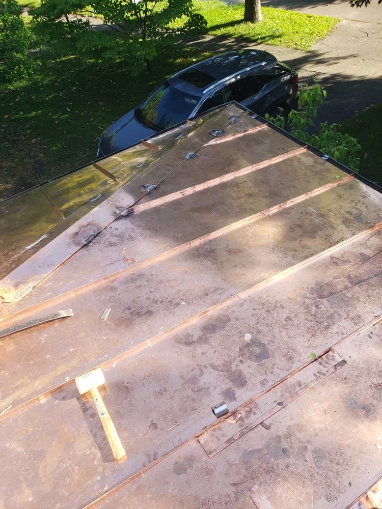 Slide of West Roofing