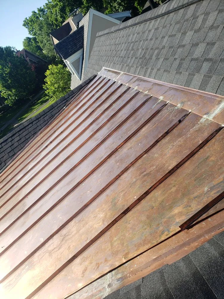 Slide of West Roofing