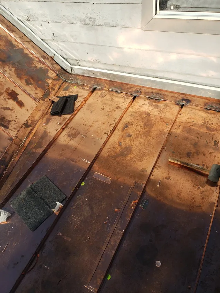 Slide of West Roofing