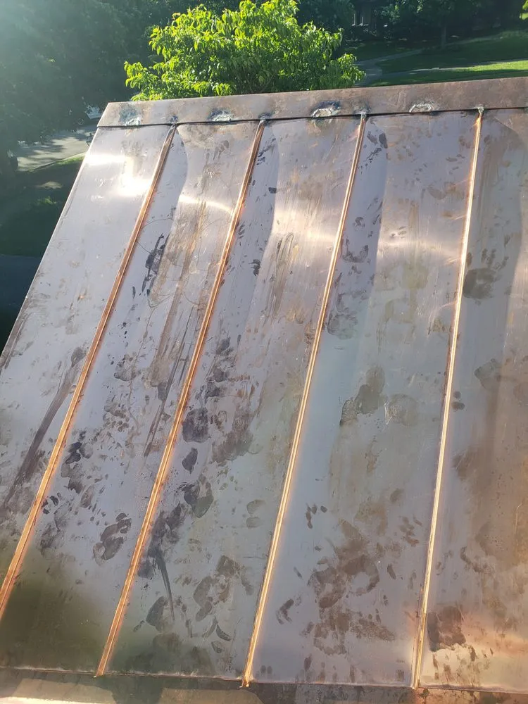 Slide of West Roofing