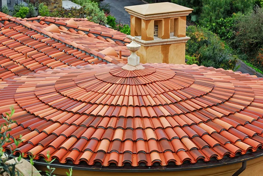 Licensed storm damage roof repair for residential properties in Huffman, TX by West Roofing Services