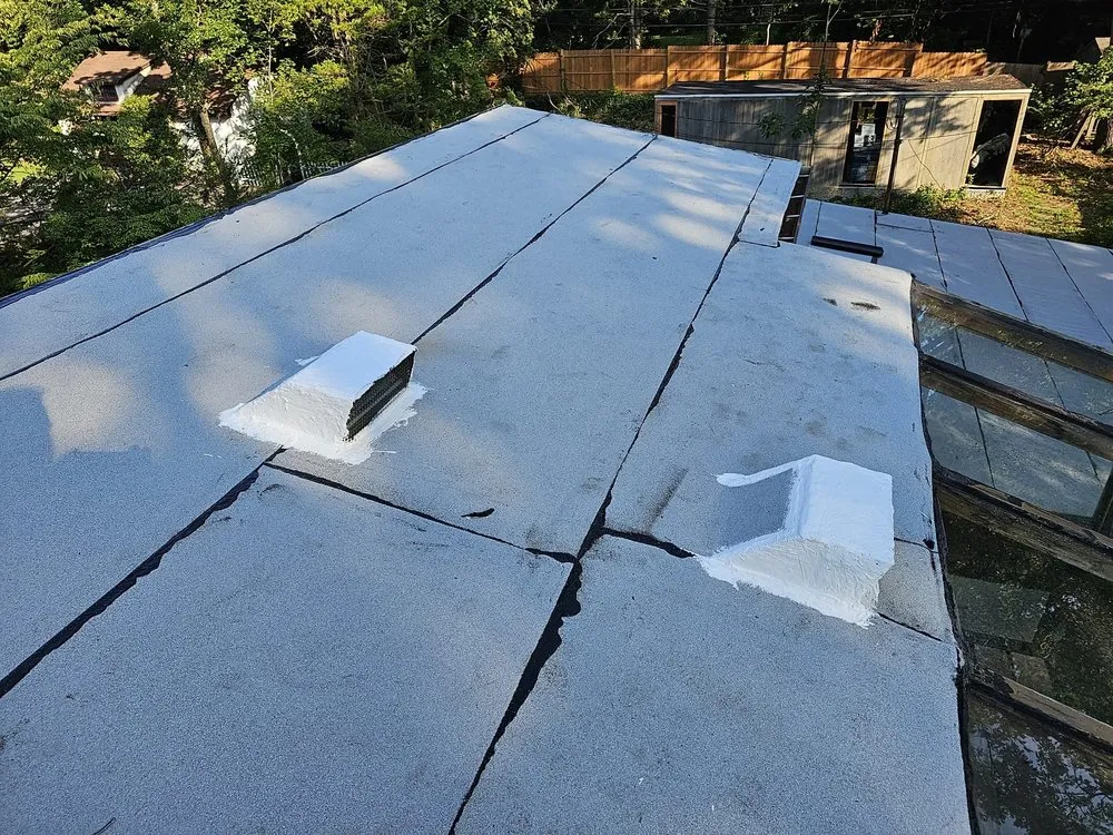 Slide of Westbury Roofing Pros