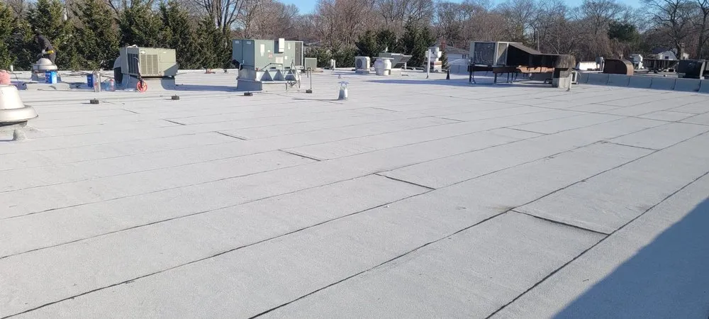 Slide of Westbury Roofing Pros