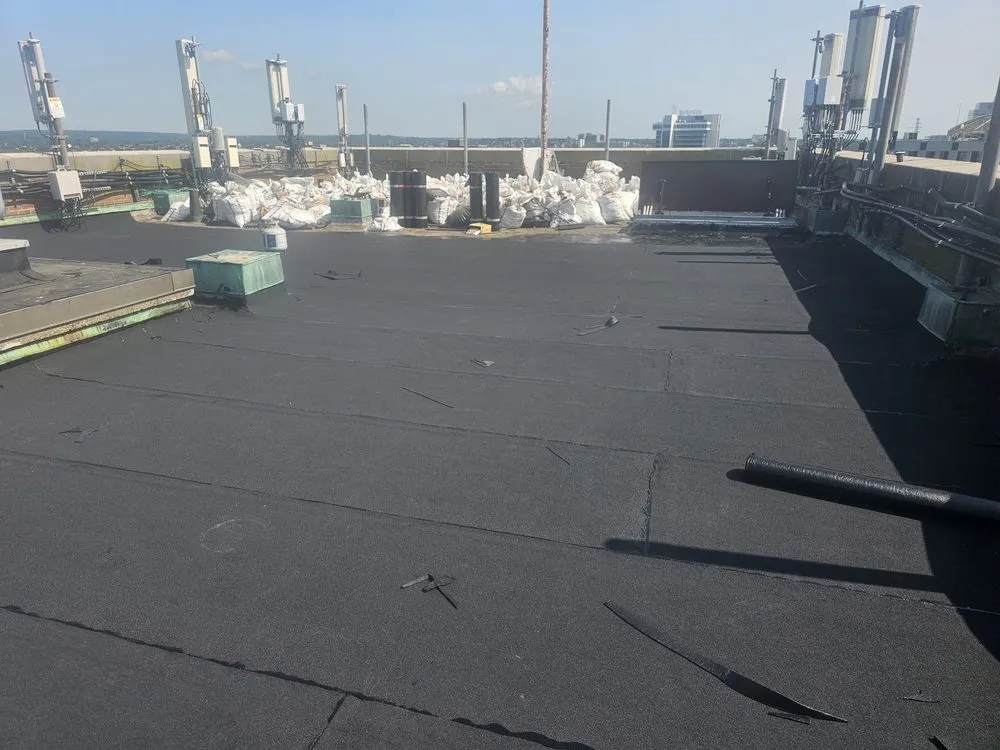 Slide of Westbury Roofing Pros