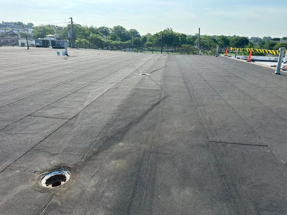 Slide of Westbury Roofing Pros