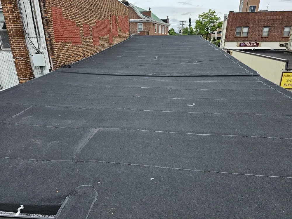 Slide of Westbury Roofing Pros