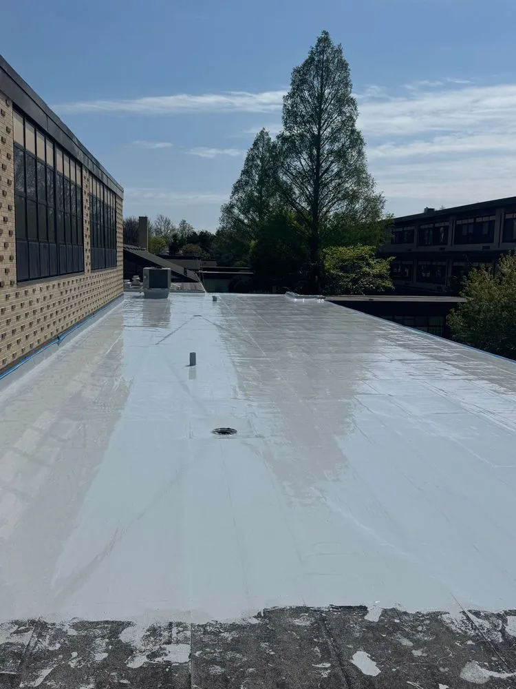 Slide of Westbury Roofing Pros