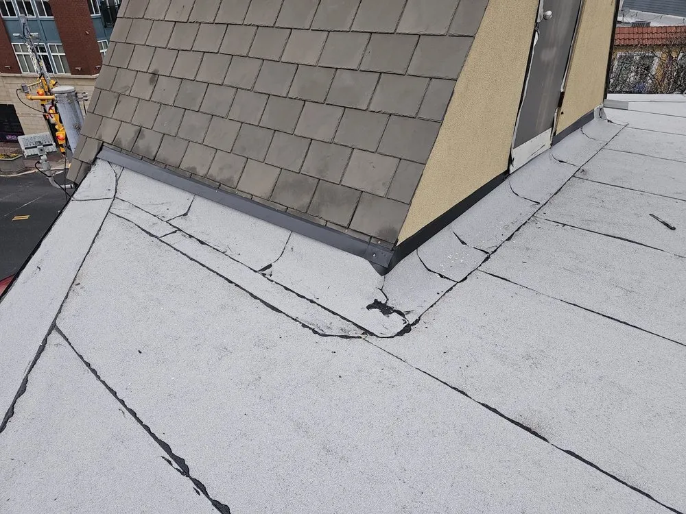 Slide of Westbury Roofing Pros