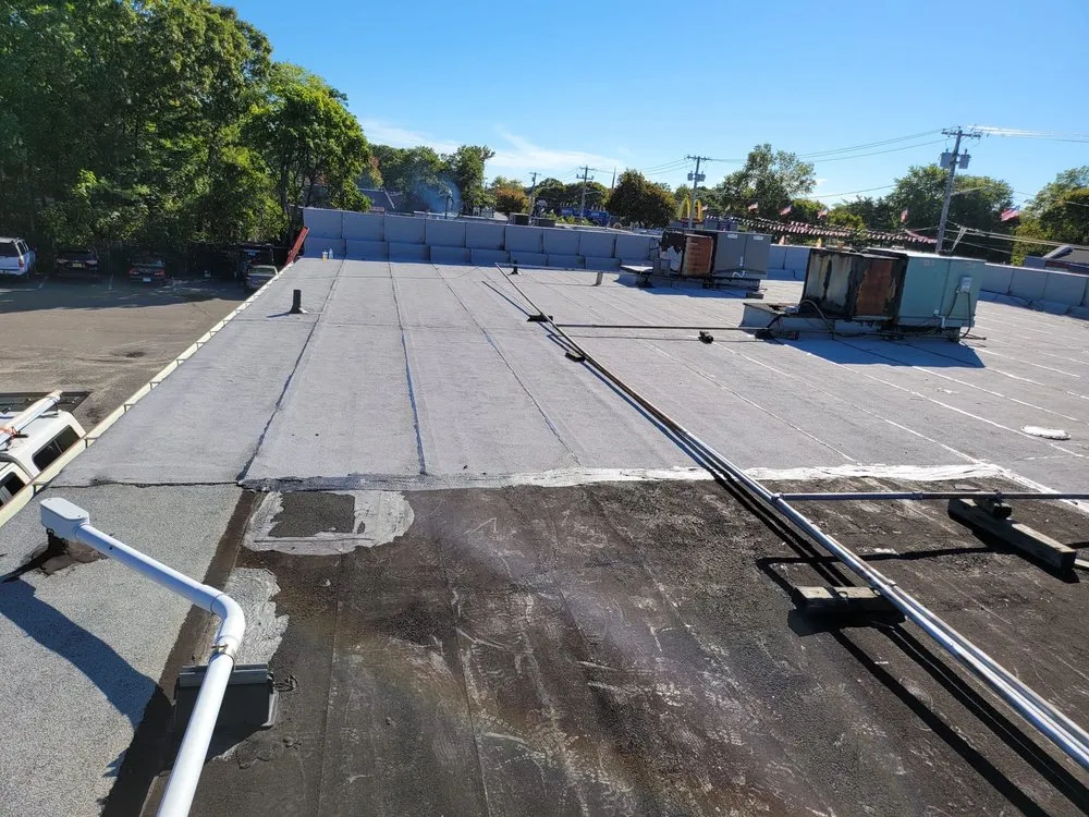 Slide of Westbury Roofing Pros