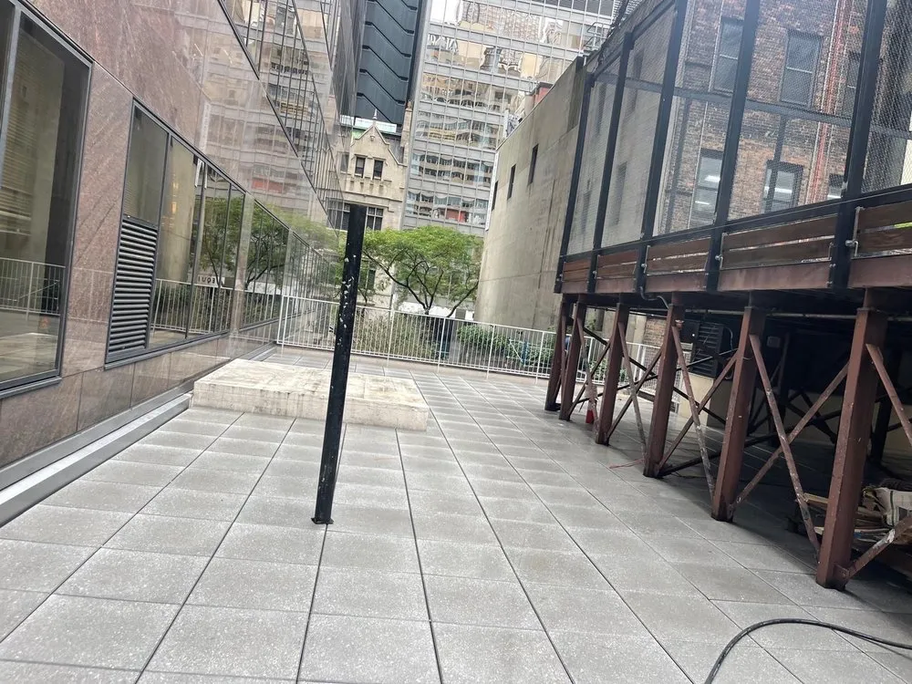 Slide of Westbury Roofing Pros