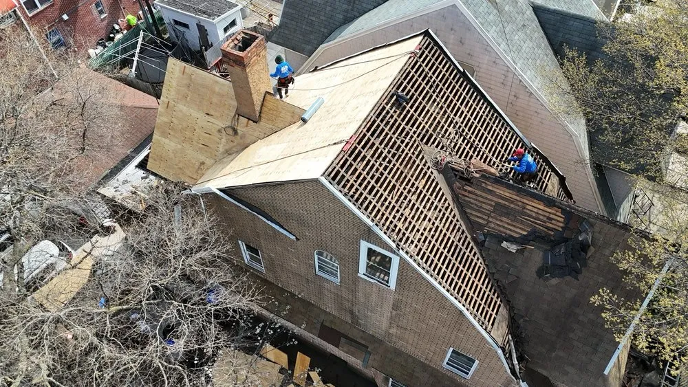 Slide of Westbury Roofing