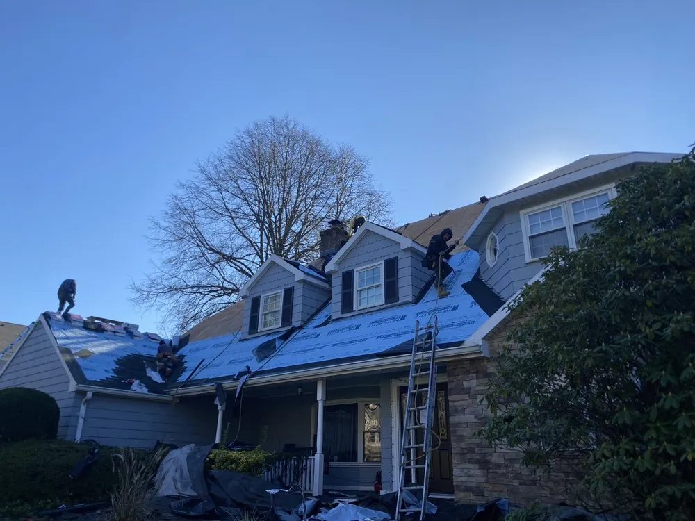 Slide of Westbury Roofing