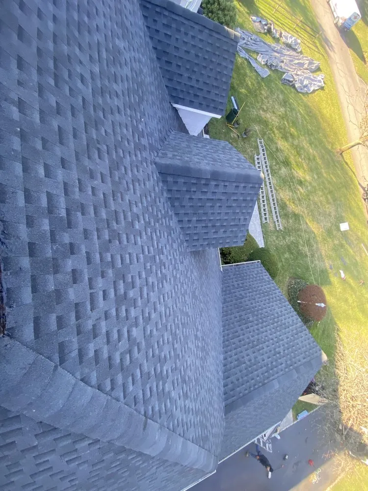 Slide of Westbury Roofing