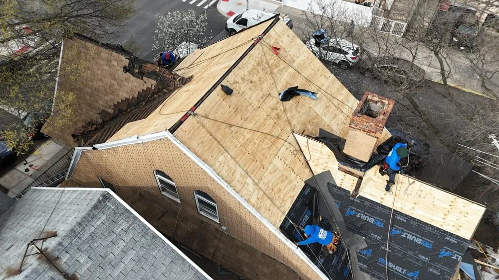 Slide of Westbury Roofing