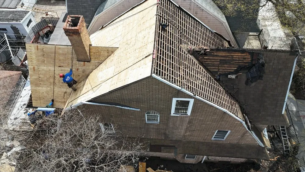 Slide of Westbury Roofing