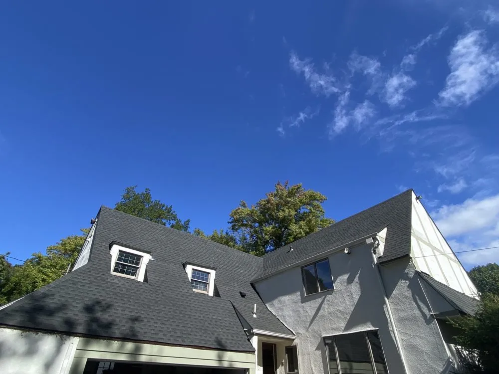 Slide of Westbury Roofing