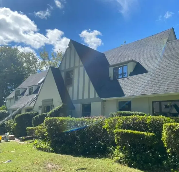 Slide of Westbury Roofing