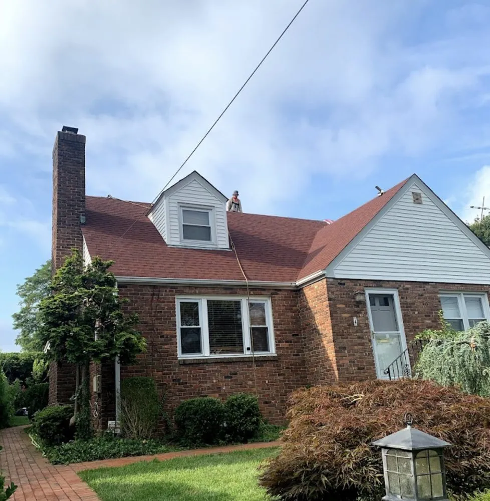 Slide of Westbury Roofing