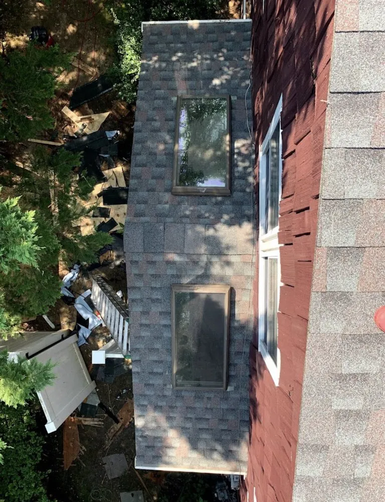 Slide of Westbury Roofing