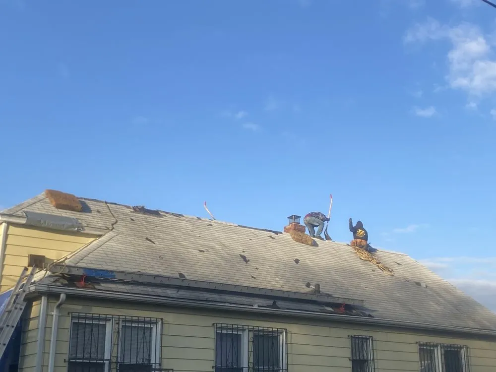 Slide of Westbury Roofing