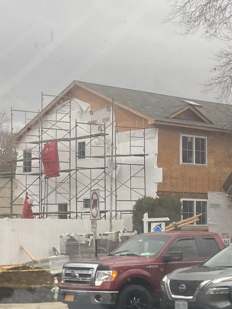 Slide of Westbury Roofing