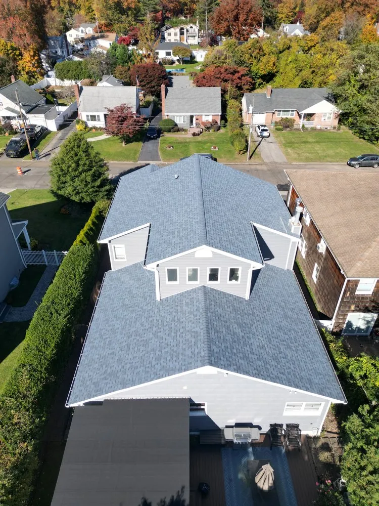 Slide of Westbury Roofing