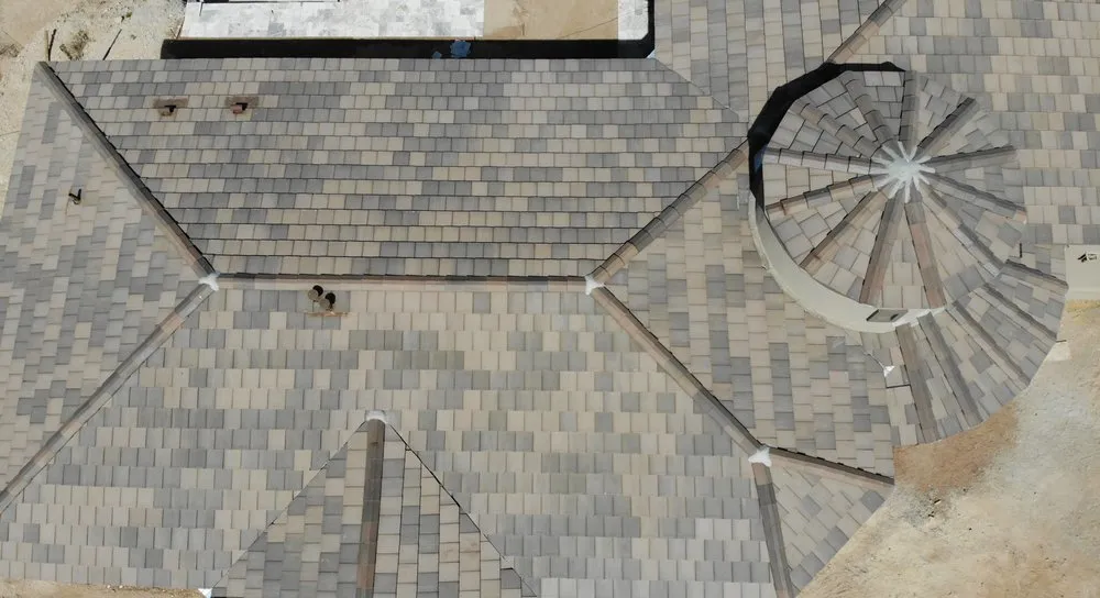 Slide of Western Roofing Installations