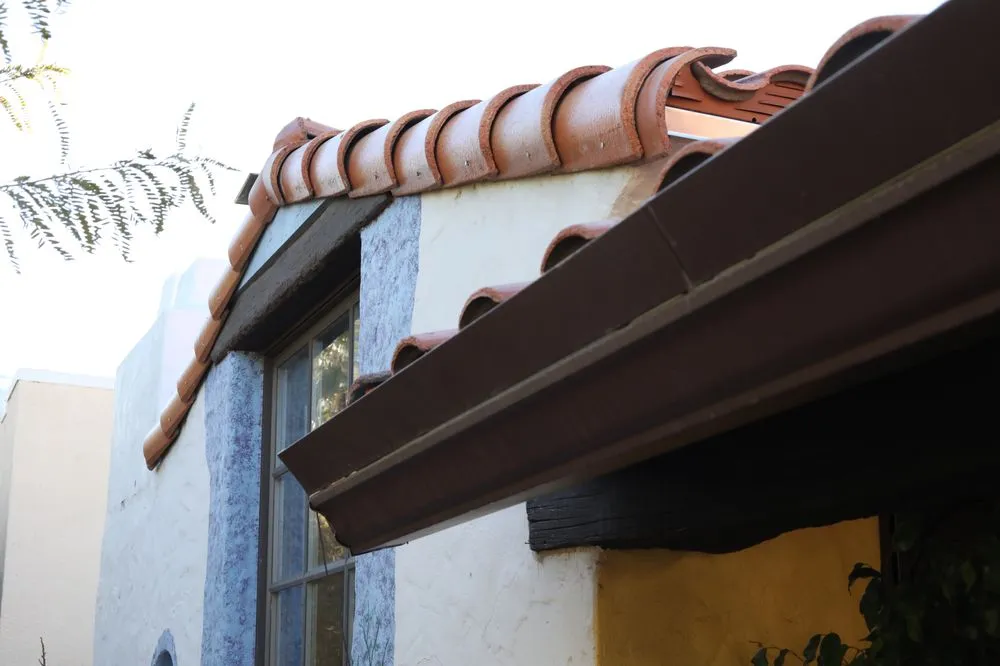 Slide of Western Roofing Installations