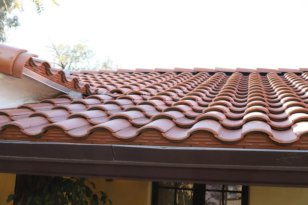 Slide of Western Roofing Installations