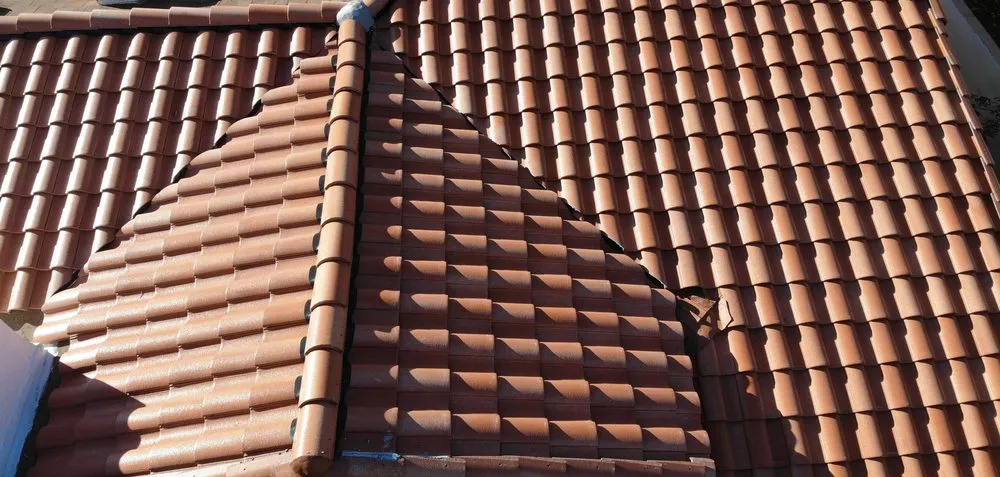 Slide of Western Roofing Installations