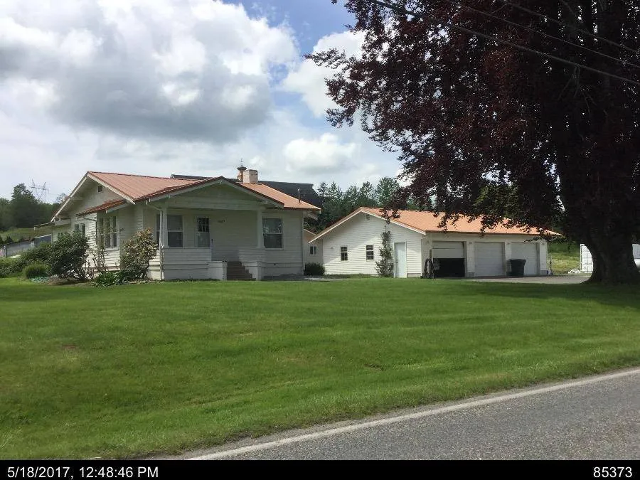 Slide of Whatcom Roofing & Home Repair