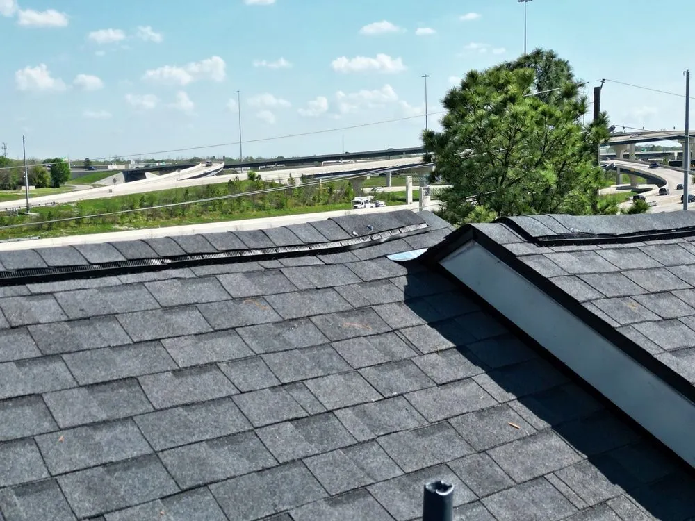 Slide of Whatley Roofing