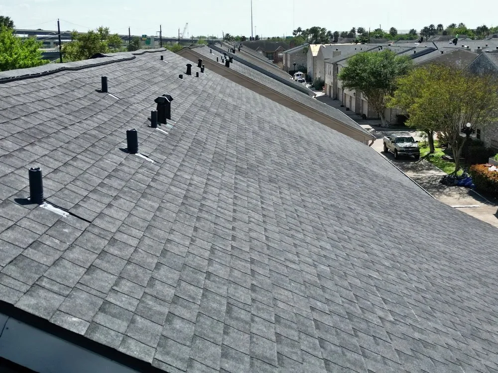 Slide of Whatley Roofing