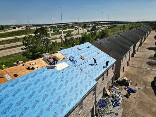 Whatley Roofing Logo