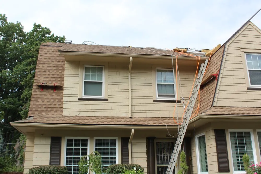 Slide of When It Wayne's Roofing Company