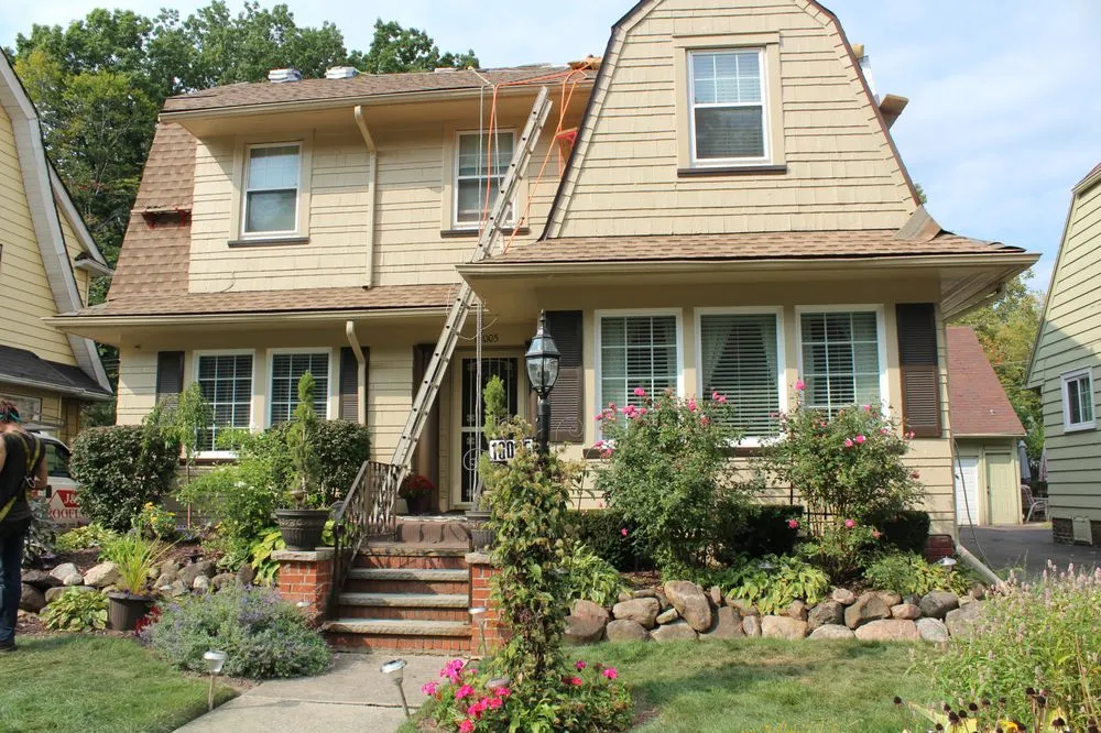 Slide of When It Wayne's Roofing Company