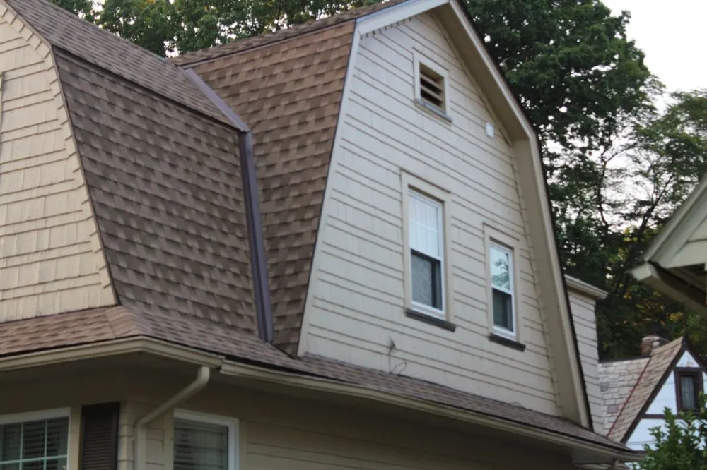 Slide of When It Wayne's Roofing Company