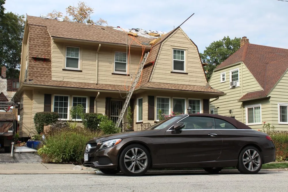 Slide of When It Wayne's Roofing Company