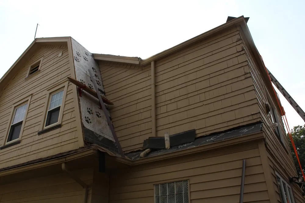 Slide of When It Wayne's Roofing Company