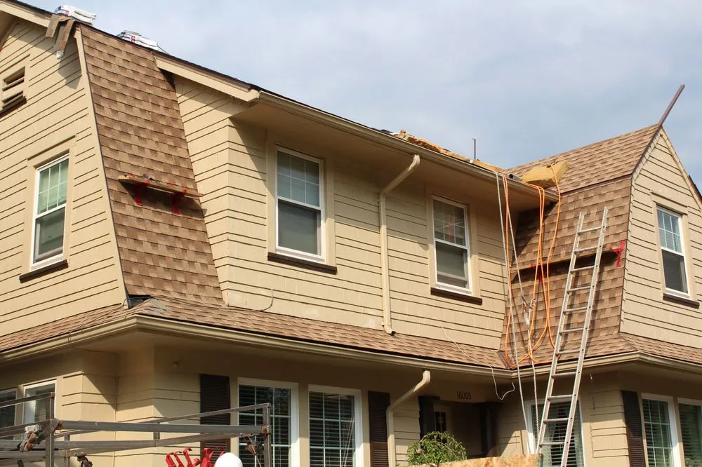 Slide of When It Wayne's Roofing Company